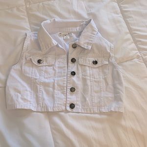 Sleeveless Denim jacket. Silver buttons. Button up. Size Medium girls (6).
